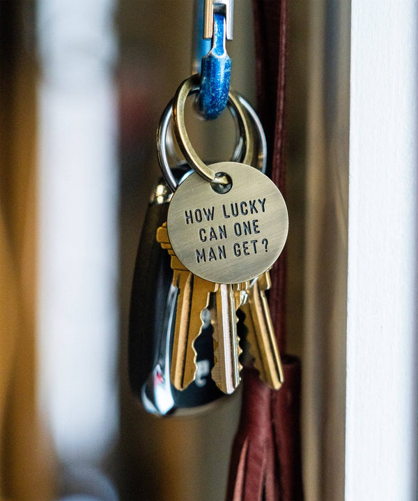 How Lucky Can One Man Get Keychain - John Prine x Oxford Pennant